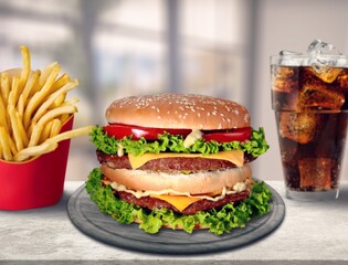 Big classic burger with juice on plate