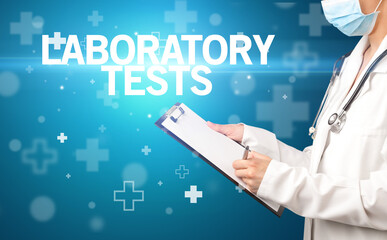 doctor writes notes on the clipboard