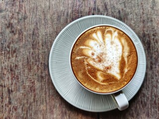 hot coffee on wooden table top view