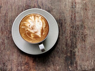 hot coffee on wooden table top view