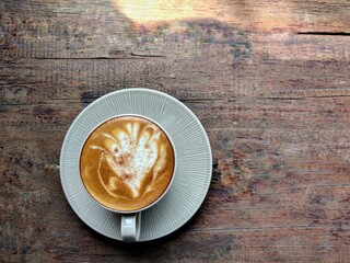 hot coffee on wooden table top view