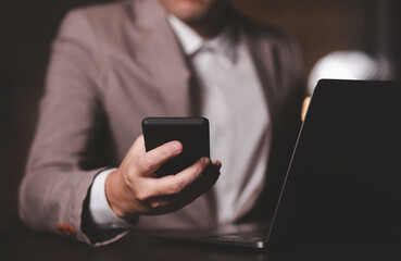 Close up hand of businessman with notebook. Concept of technoloy for business.