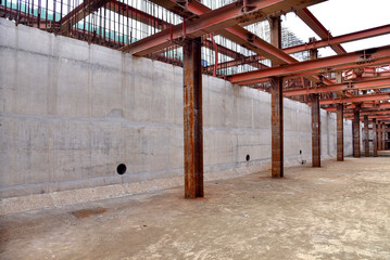 Large construction in the river for urban flood prevention. Industry execution of the steel...