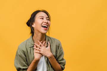 Young Asia lady feel happiness with positive expression, joyful surprise funky, dressed in casual...