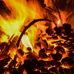 Fire flames on black background, Blaze fire flame texture background, Beautifully, the fire is burning, Fire flames with wood and cow dung bonfire © rahul
