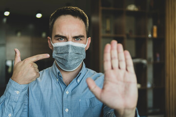 Mandatory wearing of a mask in a public place. The evil guard forbids passing without a mask. The...