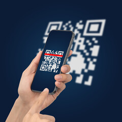 Hand using mobile smart phone scan Qr code. Barcode reader, Qr code payment, Cashless technology, Digital money concept.