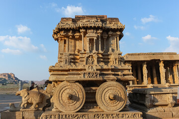 hampi stone chariot the antique stone art piece from unique angle with amazing blue sky image is...