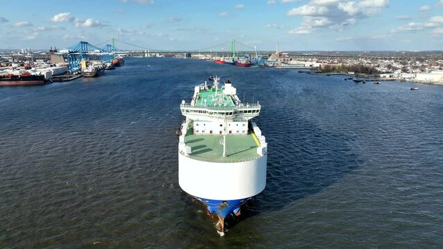 Aerial View of Automobile Carrier Ship  Leaving Port
