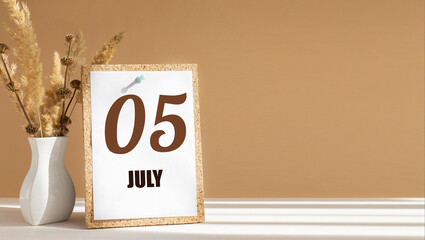 july 5. 5th day of month, calendar date.White vase with dead wood next to cork board with numbers. White-beige background with striped shadow. Concept of day of year, time planner, summer month