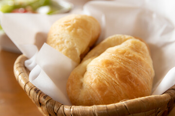 croissant in a basket on table