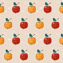 Seamless vector pattern with hand-drawn red and yellow apples on a beige speckled background
