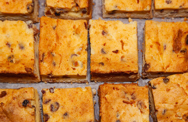 Batch of baked cheese cakes, top view.