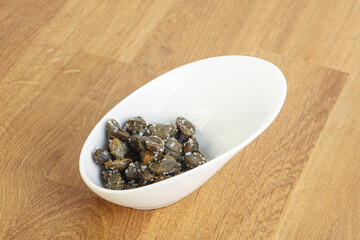 Salted marinated capers snack appetiser