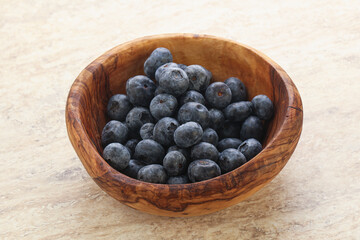 Sweet ripe blueberry heap in the bowl