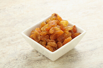 Sweet yellow raisin in the bowl
