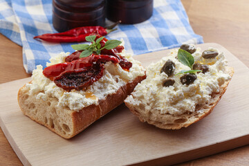 bruschetta with soft cheese capers and tomato