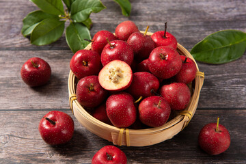 ripe hawthorn fruits on table