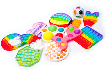 Rainbow bubble toys in different shapes to relieve stress.