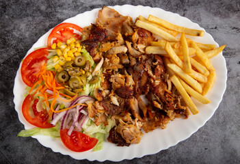 Kebab sandwich on white plate isolated