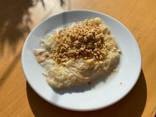 Traditional Turkish Dessert Kadayif  with Milk and Hazelnut Powder. Sutlu Nuriye.