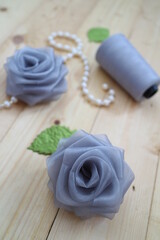Fototapeta na wymiar flower handmade from organza ribbon