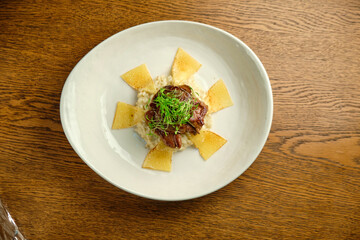 Risotto with tartare sauce and cheese