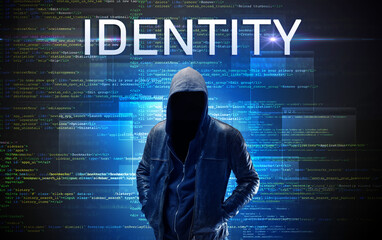 Faceless hacker on code background
