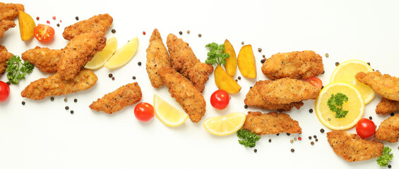 Concept of tasty food with chicken strips on white background