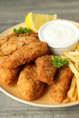 Concept of tasty food with chicken strips, close up