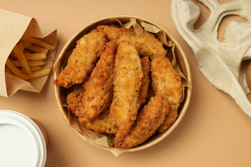 Concept of tasty food with chicken strips, top view