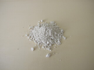 White slurry chalk powder for peeling or mask on a wooden board