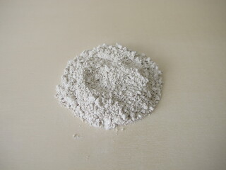 White slurry chalk powder for peeling or mask on a wooden board