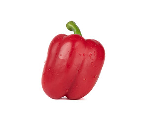 Drops of water on a pod of red sweet pepper on a white background.