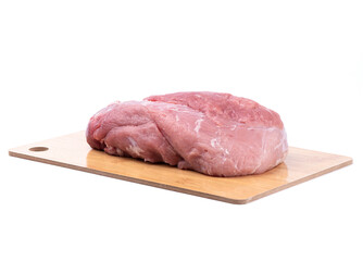 Fresh juicy pork meat on a cutting board on a white background.