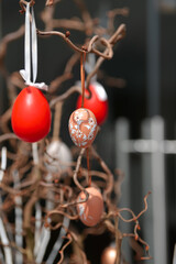 Easter decorations inside a house. Beautiful details with eggs and other Easter objects.