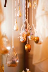 Easter decorations inside a house. Beautiful details with eggs and other Easter objects.