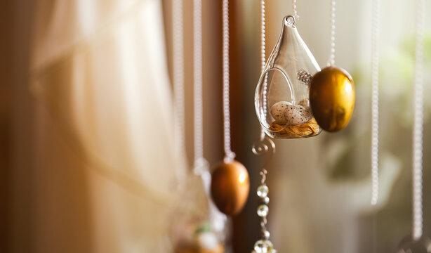 Easter decorations inside a house. Beautiful details with eggs and other Easter objects.