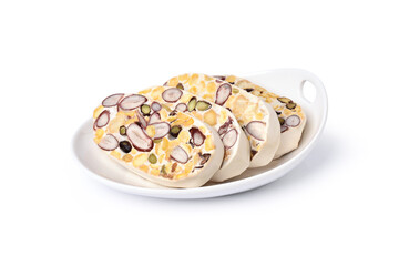Fresh tempeh (Tempe) in white ceramic plate isolated on white background with clipping path..