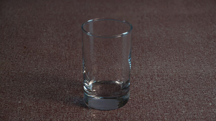 Empty glass on table