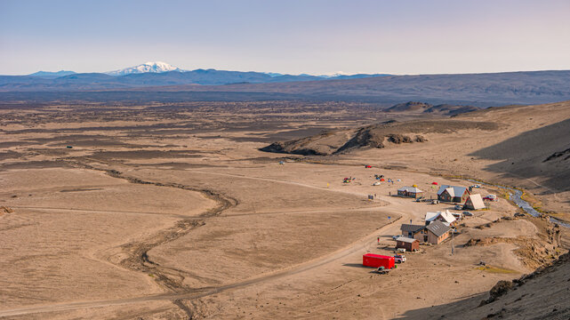 Icelandic Moon like landscape near colorful volcanic caldera Askja, in the middle of volcanic desert in Highlands, Iceland, and camping site and mountain hut.