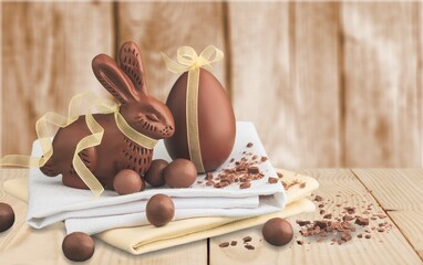 Fototapeta na wymiar Chocolate Easter eggs with chocolate bunny. Easter holiday concept