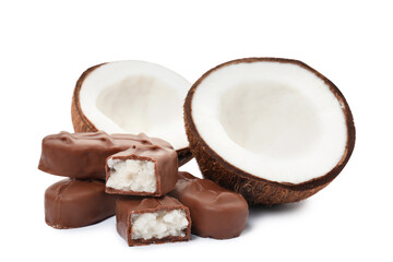 Delicious milk chocolate candy bars with coconut filling on white background