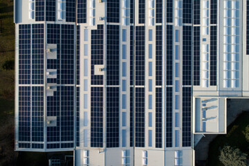 Industrial building with solar panels on the roof top for green energy production