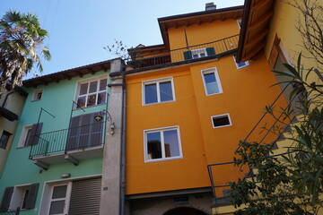 Fototapeta na wymiar facade of colorful houses in the village of Vira, Ticino