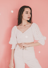 Woman model appearance on a pink background