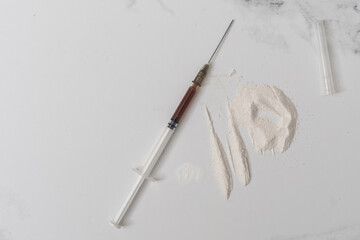 Syringes, drugs, heroin, and cooked.