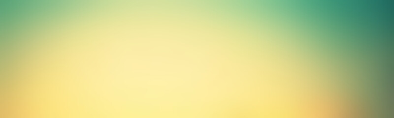 Wide wallpaper in modern smooth abstract gradient light yellow. Defocused template light golden yellow. The smoothness of on the background of the gradation using a subtle combination beautiful.