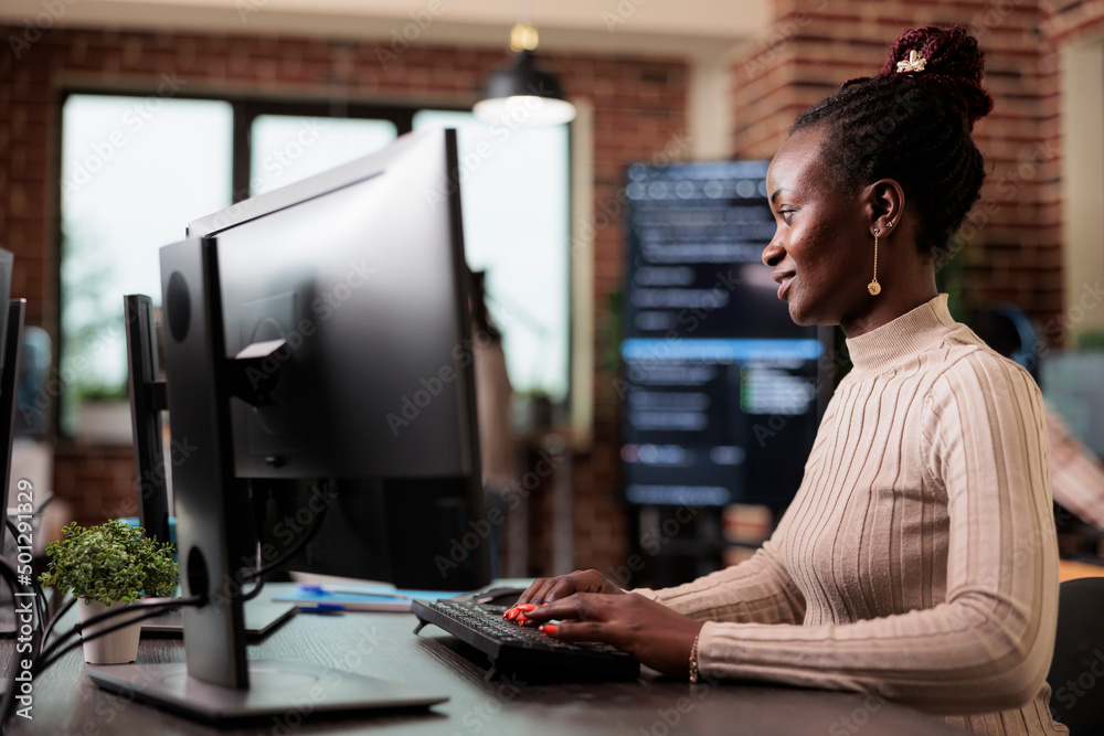 Poster confident african american network developer engineering application for company database. cyber sec