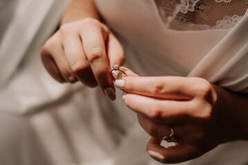 Obraz na płótnie Canvas Wedding dress, wedding rings, bride accessories